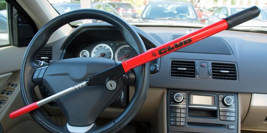 red steering wheel club lock on car